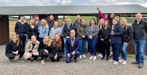 Large corporate group photo at Yorkshire Activity Centre facility